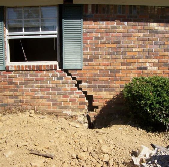 Brick house foundation in need of repair